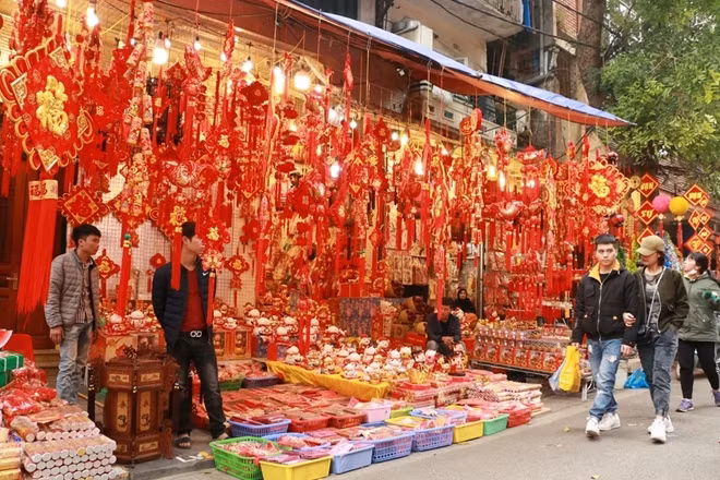 Thousands of Tet related products are offered for sale at small stalls.