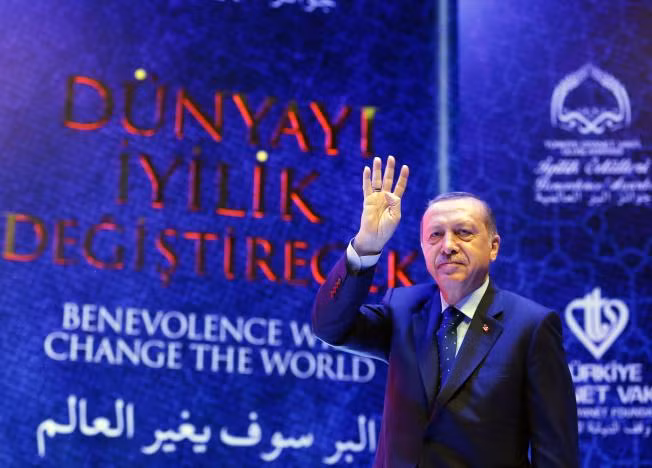 Turkish President Tayyip Erdogan greets the audience as he arrives for a ceremony in Istanbul, Turkey, March 12, 2017. Kayhan Ozer/Presidential Palace/Handout via REUTERS