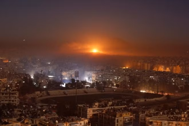 Smoke and flames rise after air strikes on rebel-controlled besieged area of Aleppo, as seen from a government-held side, in Syria December 11, 2016. REUTERS/Omar Sanadiki