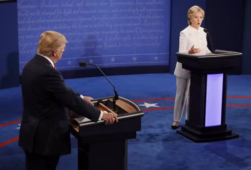 Republican U.S. presidential nominee Donald Trump listens as Democratic U.S. presidential nominee Hillary Clinton speaks during their third and final 2016 presidential campaign debate at UNLV. (Photo: Reuters)