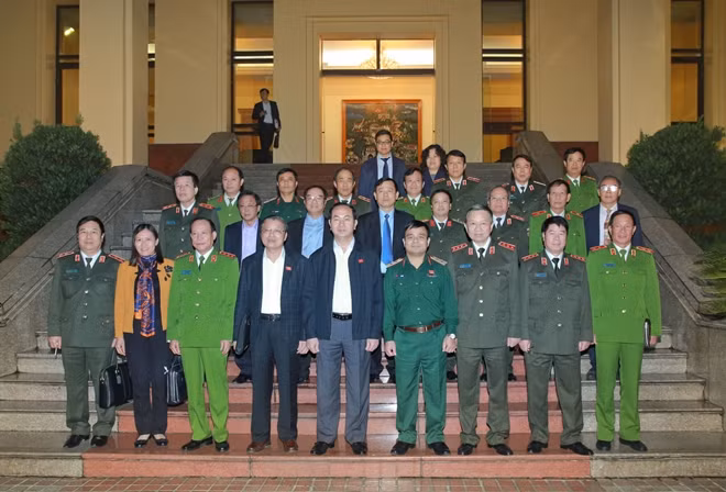 President Tran Dai Quang and representatives from the Ministry of Public Security, Ministry of National Defense, and the Supreme People’s Court.