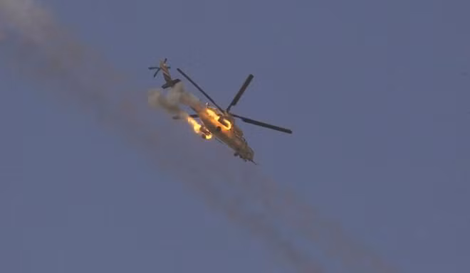 An Army helicopter fires its weapons as Iraqi forces battle with Islamic State's fighters in western Mosul, Iraq March 12, 2017. REUTERS/Zohra Bensemra