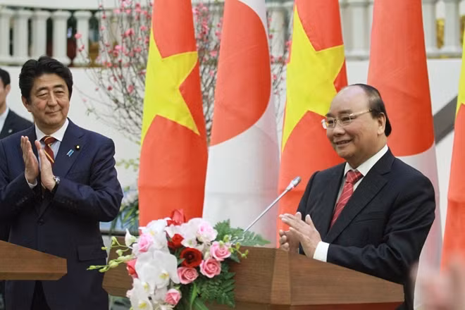 The two PMs at a press-conference. The two PMs at a press-conference.