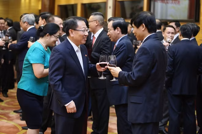 The party takes place in a cheerful and friendly atmosphere.