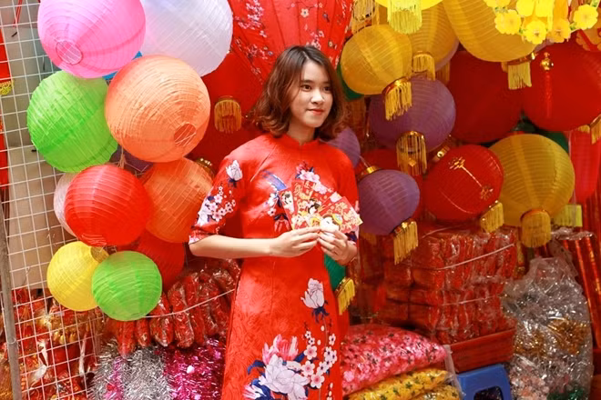 The Old Quarter streets in Hanoi city are brimming with busy people as they flock to local shops to prepare for the most important traditional festival of the year – the Lunar New Year (Tet).
