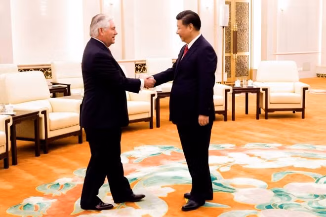 China's President Xi Jinping (R) shakes hands with U.S. State of Secretary, Rex Tillerson at the Great Hall of the People in Beijing, China, March 19, 2017. REUTERS/Thomas Peter .
