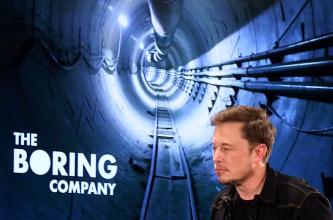 Elon Musk arrives to speak at Boring Company community meeting in Bel Air, Los Angeles, California, U.S. May 17, 2018. REUTERS