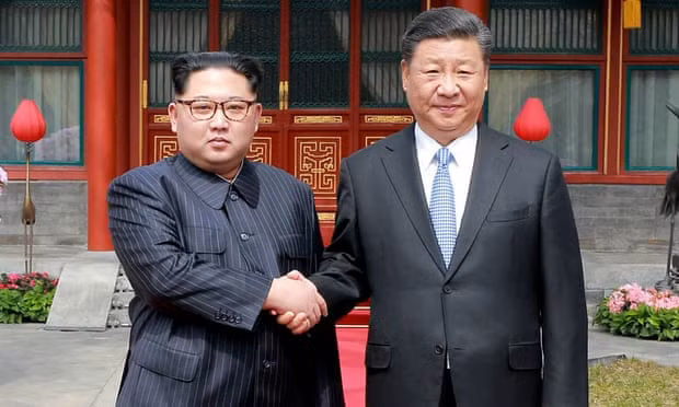 Kim Jong-un and Xi Jinping at their meeting in Beijing, China, in 2018. Photograph: AP Kim Jong-un and Xi Jinping at their meeting in Beijing, China, in 2018. Photograph: AP