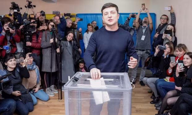 Volodymyr Zelenskiy, who plays the president in a TV series, casts his ballot in Kyiv. Photograph: Valentyn Ogirenko/Reuters