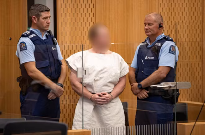 Brenton Tarrant, charged for murder in relation to the mosque attacks, is seen in the dock during his appearance in the Christchurch District Court, New Zealand March 16, 2019. Mark Mitchell/New Zealand Herald/Pool via REUTERS