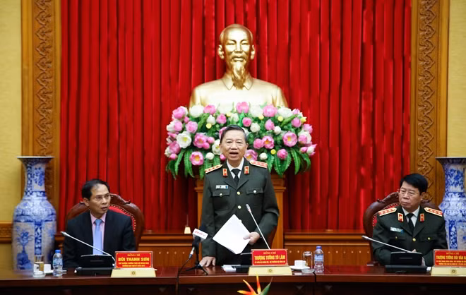 Senior Lieutenant General To Lam, Politburo Member and Minister of Public Security speaking at the event.