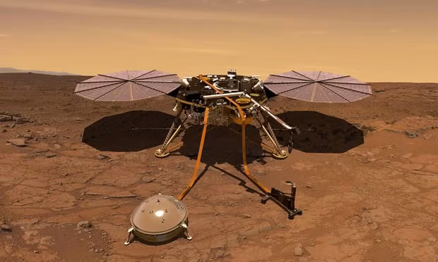 Artist’s rendition of Mars InSight probe operating on the surface of Mars. Photograph: Nasa/Reuters