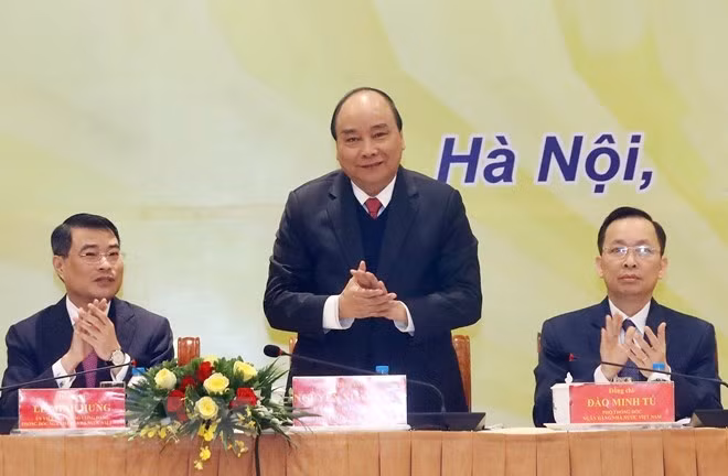 Prime Minister Nguyen Xuan Phuc (middle) at the event (Photo: VNA)