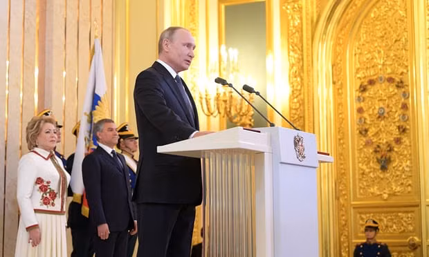 Vladimir Putin delivers a speech during his inauguration ceremony at the Kremlin. Photograph: Anadolu Agency/Getty Images