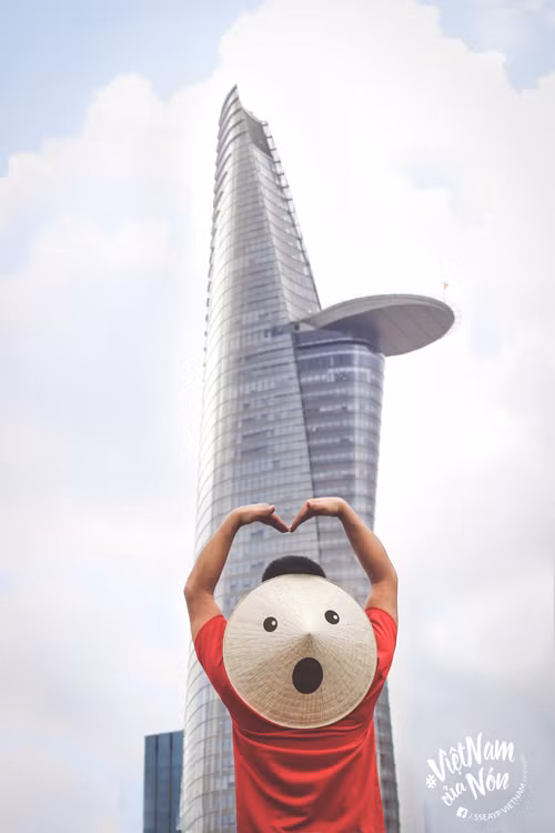 Marveling at Ho Chi Minh City's Bitexco tower.