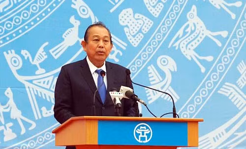 Standing Deputy Minister Truong Hoa Binh speaking at the event. Standing Deputy Minister Truong Hoa Binh speaking at the event.