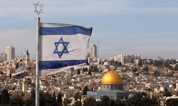 Israeli flag flies overlooking the old city of Jerusalem. Donald Trump will recognise holy city as the capital of Israel according to White House officials. Photograph: Abir Sultan/EPA Israeli flag flies overlooking the old city of Jerusalem. Donald Trump will recognise holy city as the capital of Israel according to White House officials. Photograph: Abir Sultan/EPA