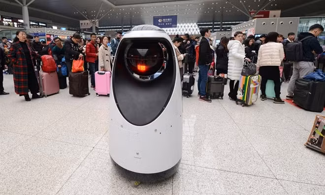 A police patrol robot at Zhengzhou East railway station. Photograph: VCG via Getty Images
