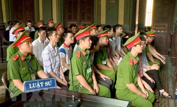 The defendants involved in a terrorism plot targeting Tan Son Nhat International Airport at the court on June 4. (Photo: VNA)