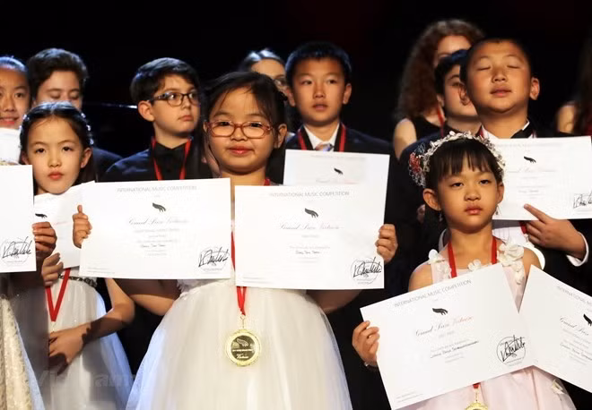 Tran Bang Tam at a piano competition (Photo: VNA) Tran Bang Tam at a piano competition (Photo: VNA)
