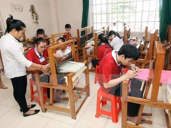 A vocational training class for people with disabilities (Photo: VNA) A vocational training class for people with disabilities (Photo: VNA)