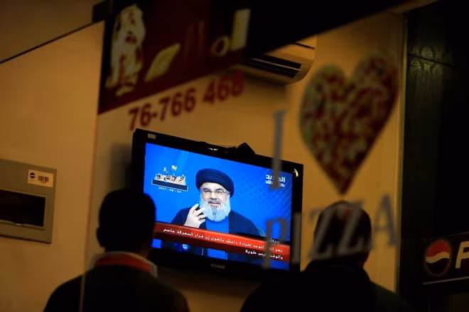 Lebanon's Hezbollah leader Sayyed Hassan Nasrallah is seen speaking on television in Sidon in southern Lebanon, August 24, 2017.