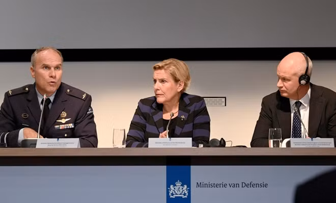 Dutch Minister of Defence Ank Bijleveld, general Onno Eichelsheim, director of Netherlands Defence Intelligence and Security Service and British Ambassador to the Netherlands Peter Wilson attend a news conference in The Hague, Netherlands, October 4, 2018. REUTERS/Piroschka van de Wouw