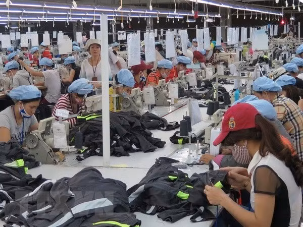 Garment and textile firms should enhance association to overcome challenges from the CPTPP (Photo: VNA) Garment and textile firms should enhance association to overcome challenges from the CPTPP (Photo: VNA)