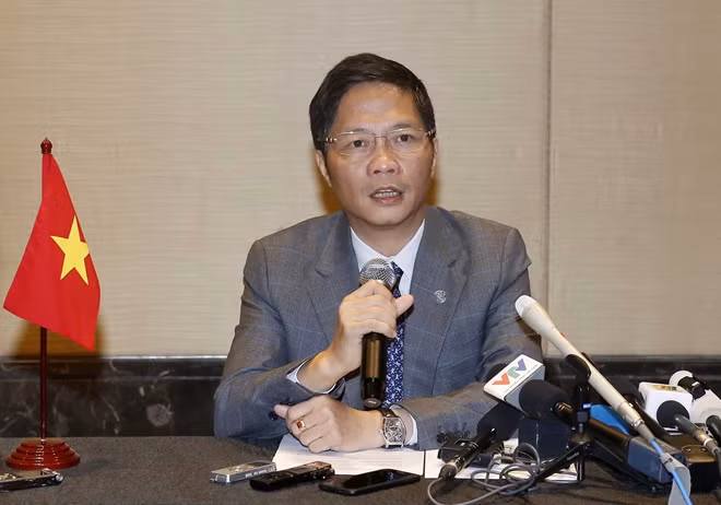 Minister of Industry and Trade Tran Tuan Anh in a press conference Minister of Industry and Trade Tran Tuan Anh in a press conference