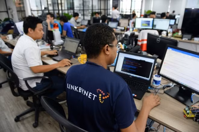 A foreign worker at a French startup company in Ho Chi Minh City. Photo by AFP A foreign worker at a French startup company in Ho Chi Minh City. Photo by AFP