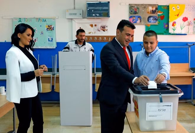 Macedonia's PM Zoran Zaev, his wife Zorica and his son Dushko cast their ballot for the referendum in Macedonia on changing the country's name that would open the way for it to join NATO and the European Union in Strumica, Macedonia September 30, 2018. REUTERS/Ognen Teofilovski