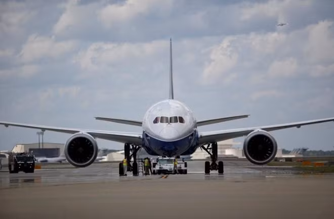Workers check over the new Boeing 787-10 Dreamliner after it's first test flight at the Charleston International Airport in North Charleston, South Carolina, United States March 31, 2017. Reuters
