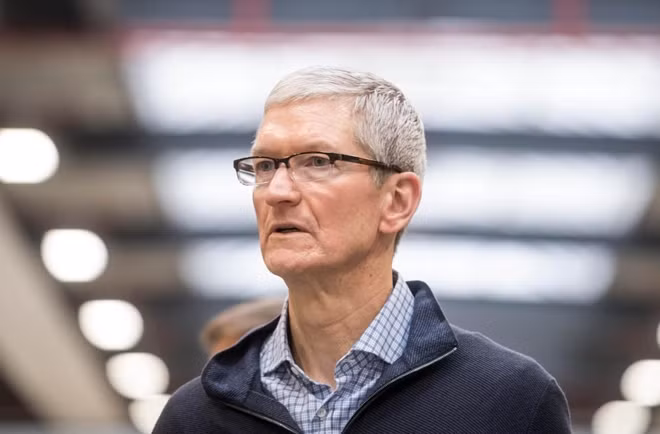 Tim Cook met Theresa May and said the UK would be 'just fine' BERND THISSEN/AFP/Getty Images