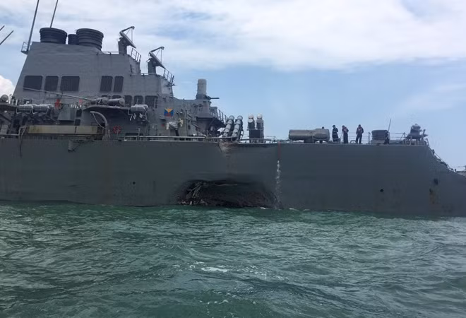 The U.S. Navy guided-missile destroyer USS John S. McCain is seen after a collision, in Singapore waters August 21, 2017. Reuters