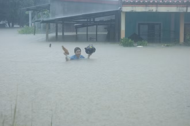 On Friday afternoon, about 1,200 houses were submerged under 0.8 to 2.5 meters of water, according to the authorities.
