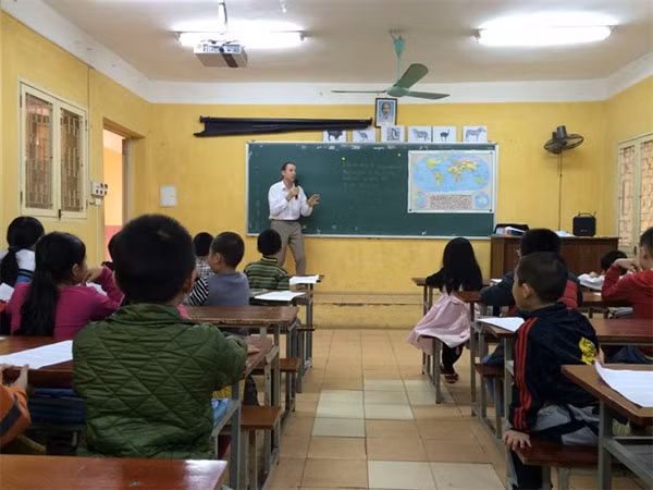 Paying it forward: Paul George Harding has taught English for free over the past two and a half years.— Photo courtesy of Paul