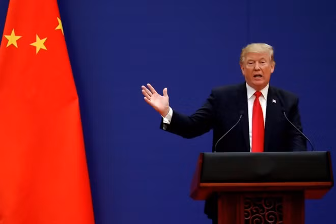 U.S President Donald Trump delivers his speech as he and China's President Xi Jinping meet business leaders at the Great Hall of People in Beijing, China, November 9, 2017. Reuters