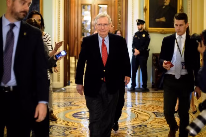 U.S. Senate Majority Leader Mitch McConnell (R-KY) leaves the Senate floor during debate over the Republican tax reform plan in Washington, U.S., December 1, 2017. REUTERS/James Lawler Duggan
