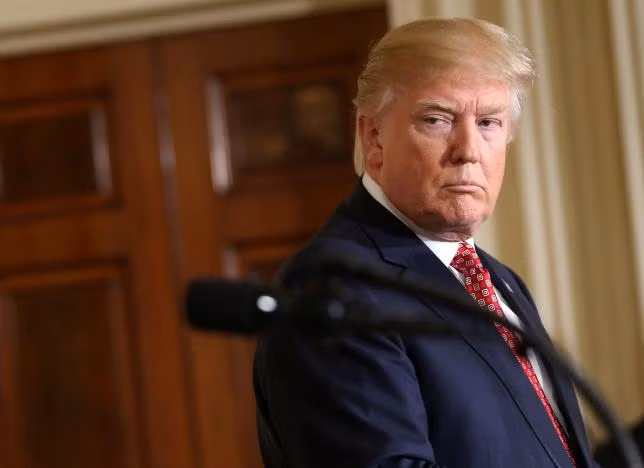 U.S. President Donald Trump looks at Japanese Prime Minister Shinzo Abe during a joint news conference at the White House in Washington, U.S., February 10, 2017. REUTERS