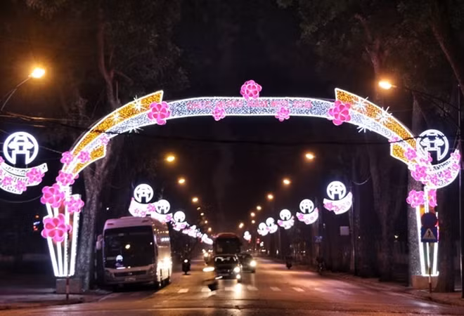 City streets are brightly lit at night.
