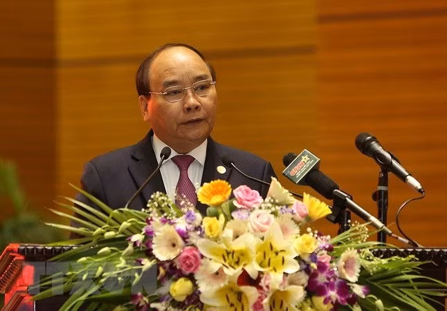 Prime Minister Nguyen Xuan Phuc speaks at the political-military conference in Hanoi on June 28 (Photo: VNA)