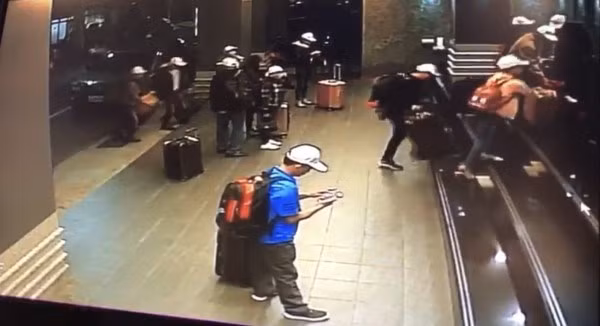 Alleged fleeing Vietnamese tourists captured by a CCTV at a hotel before disappearing (Photo: CNA)