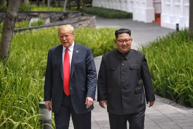 President Donald Trump walks with North Korean leader Kim Jong Un at the Capella Hotel on Sentosa island in Singapore on June 12, 2018. Reuters