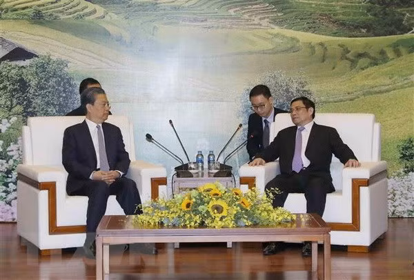 Politburo member, Secretary of the Party Central Committee and head of its Organisation Commission Pham Minh Chinh (R) and Zhao Leji, member of the Standing Board of the Political Bureau of the Communist Party of China (CPC) Central Committee and Secretary of its Commission for Discipline Inspection (Photo: VNA) Politburo member, Secretary of the Party Central Committee and head of its Organisation Commission Pham Minh Chinh (R) and Zhao Leji, member of the Standing Board of the Political Bureau of the Communist Party of China (CPC) Central Committee and Secretary of its Commission for Discipline Inspection (Photo: VNA)