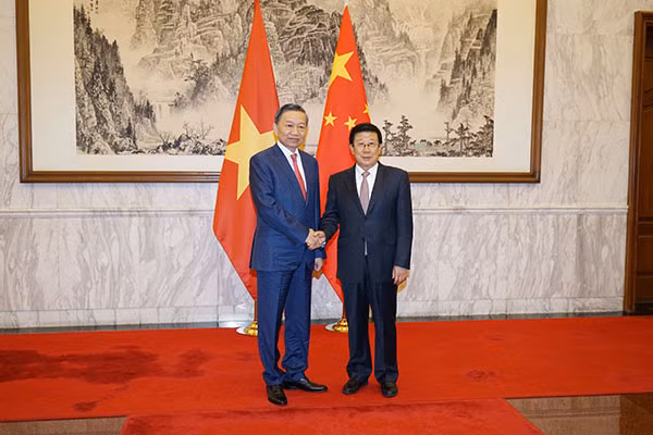 Minister To Lam and Minister Zhao Kezhi.