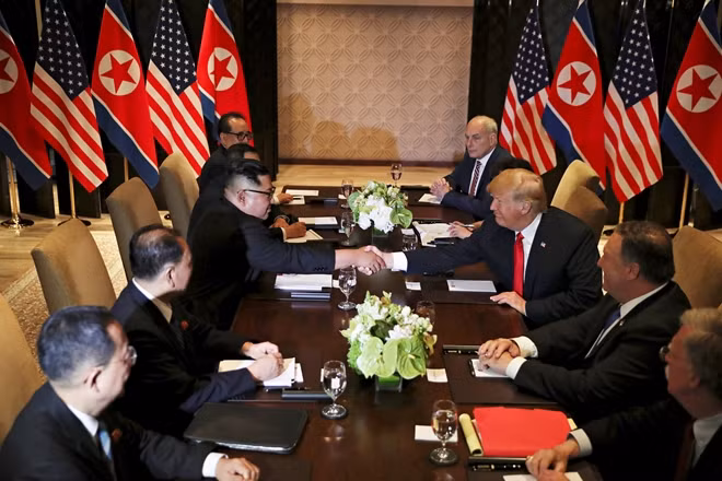 U.S. President Donald Trump and North Korea's leader Kim Jong Un hold talks in Singapore on June 12. Photo: Reuters.