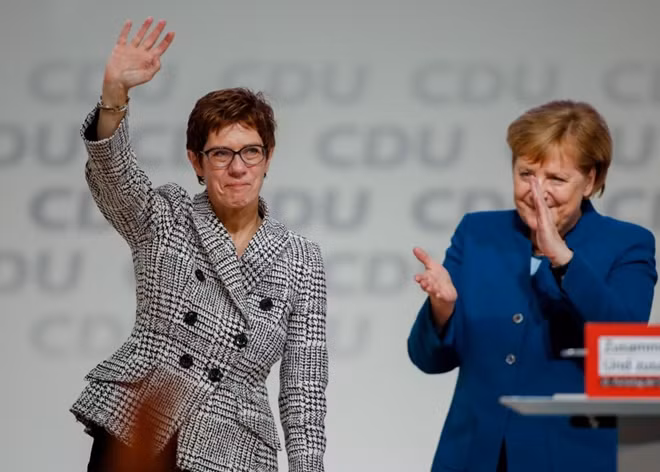 Annegret Kramp-Karrenbauer, the new leader of Germany's CDU, is congratulated by Angela Merkel | Odd Andersen/Getty Images