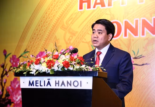 Chairman of the Hanoi People’s Committee Nguyen Duc Chung speaking at the reception.