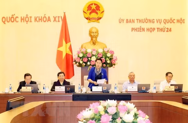 National Assembly Chairwoman Nguyen Thi Kim Ngan (standing) addresses the opening of the NA's 24th session (Photo: VNA)