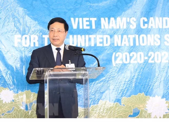 Deputy Prime Minister and Foreign Minister Pham Binh Minh addresses a programme to call for support to Vietnam’s candidacy as a non-permanent member of the United Nations Security Council (Photo: VNA)